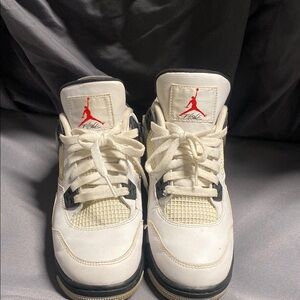 White and Black Sneakers with Red Logo